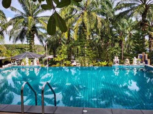 Fotografie z fotogalerie ubytování Palm Tian Homes A17 v destinaci Ban Chong Phli