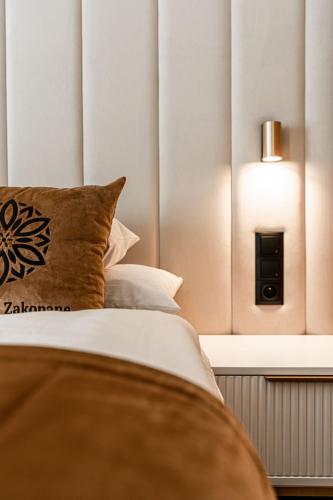 Cama o camas de una habitación en Aparthotel Zakopane