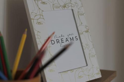 a card with the words make your dreams come true at SuperB apartment with incredible view at the best location in Veszprém