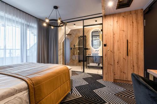 Cama o camas de una habitación en Aparthotel Zakopane