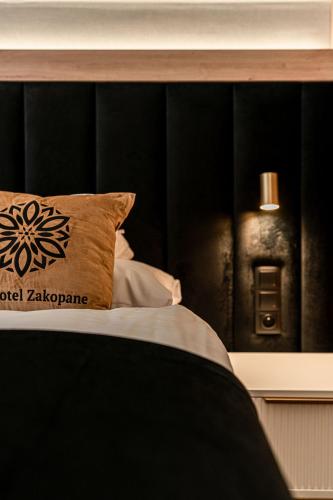 Cama o camas de una habitación en Aparthotel Zakopane