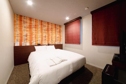 En eller flere senge i et værelse på No, 2 Taniji Building - Vacation STAY 92282v