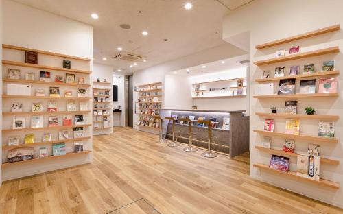 a large room with wooden shelves in a store at No, 2 Taniji Building - Vacation STAY 91383v in Tokyo