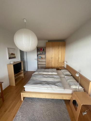 a bedroom with a large bed in a room at A Home away from Home in Ravensburg