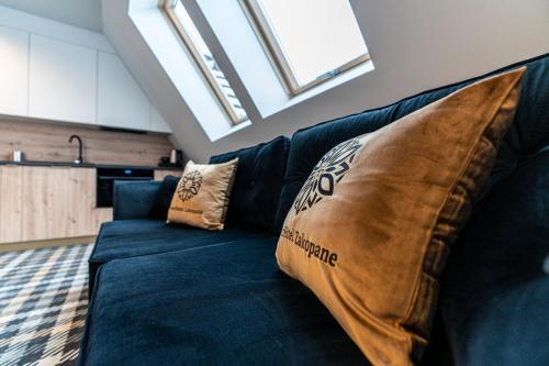 Zona de estar de Aparthotel Zakopane
