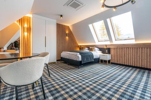 Posteľ alebo postele v izbe v ubytovaní Aparthotel Zakopane