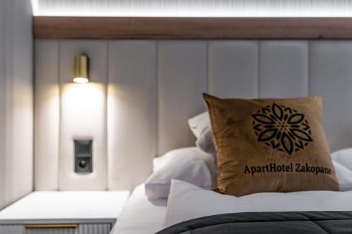 Cama o camas de una habitación en Aparthotel Zakopane