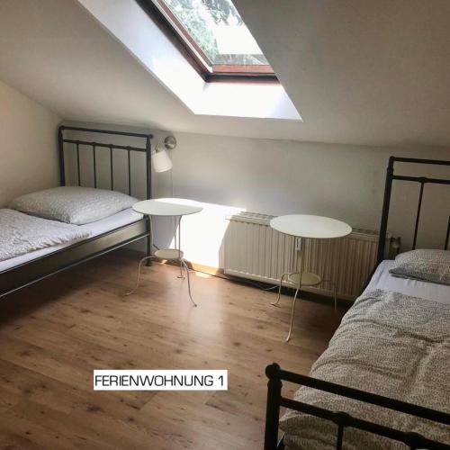 Ένα ή περισσότερα κρεβάτια σε δωμάτιο στο Clarkes Apartments