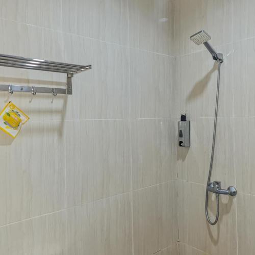 Ένα μπάνιο στο RedDoorz Plus at Hotel Royal Palangka Raya