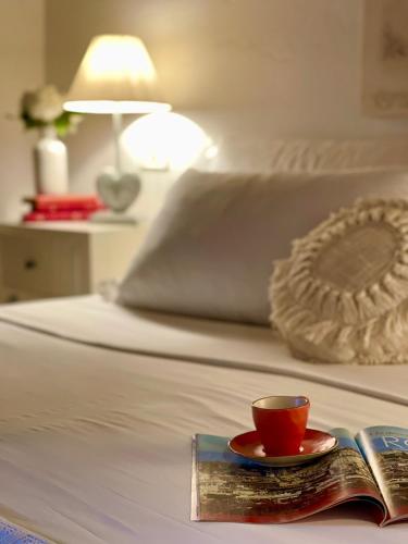 Letto o letti in una camera di Relais Il Pozzeto