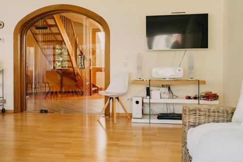 TV a/nebo společenská místnost v ubytování HerzogChalet