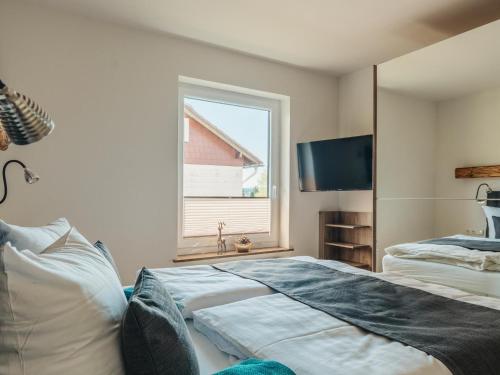 Postel nebo postele na pokoji v ubytování MiraBlau Braunlage