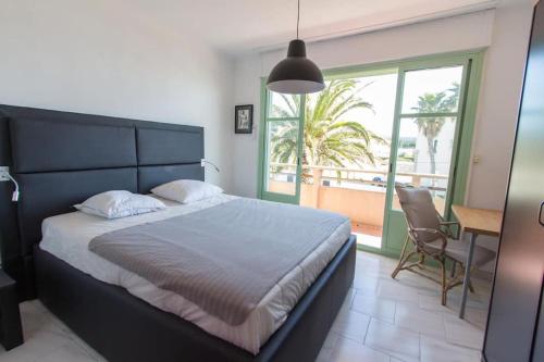 Posteľ alebo postele v izbe v ubytovaní Superbe duplex en bord de mer