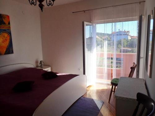 Postel nebo postele na pokoji v ubytování Apartment Putnik