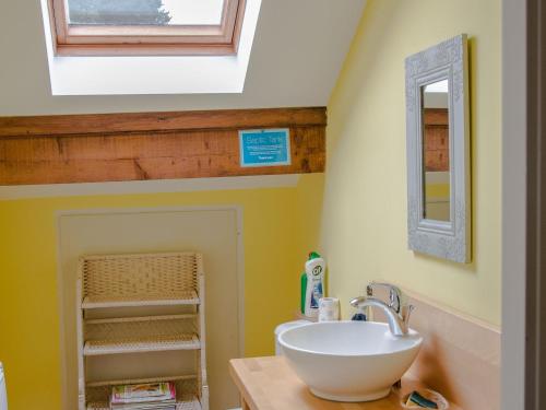 a bathroom with a sink and a mirror at Maison de charme à Lubine, idéale pour randonnées et famille, proche Alsace et stations de ski - FR-1-589-192 in Lubine