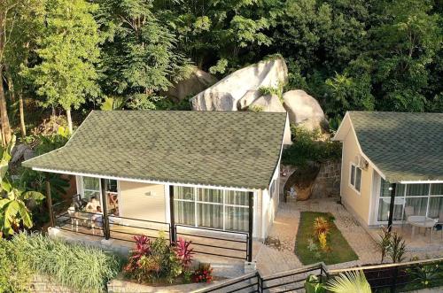 an overhead view of a house with a garden at Takamakasky Villas in Takamaka