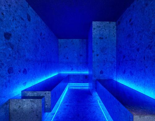 an empty room with blue lights in a room at Wellington Hotel & Spa Madrid in Madrid