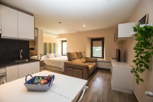 A bed or beds in a room at A Reboleira - Casa Nuñez