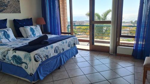 Ένα ή περισσότερα κρεβάτια σε δωμάτιο στο Villa @ 19 Palm with spectacular sea views