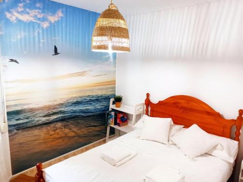 A bed or beds in a room at Apartament z basenem, przy plaży