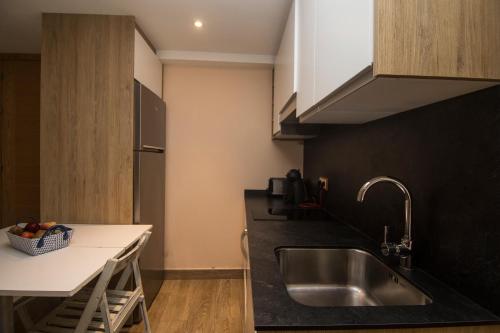 Kuchyň nebo kuchyňský kout v ubytování A Reboleira - Casa Nuñez
