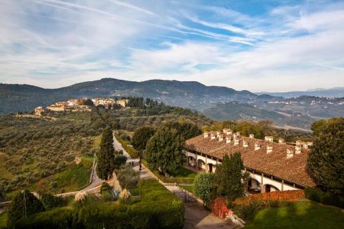 an estate with a view of a mountain at Tenuta di Artimino member of Meliá Collection in Artimino