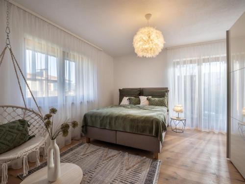 Postel nebo postele na pokoji v ubytování Ferienwohnung Dahoam