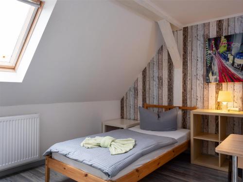 מיטה או מיטות בחדר ב-Zimmervermietung K.Krause