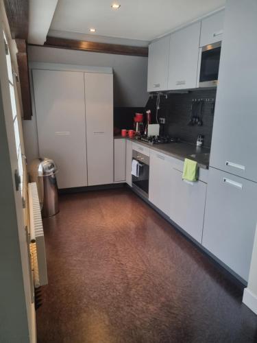 Kuchyň nebo kuchyňský kout v ubytování Hotel Oldenburg