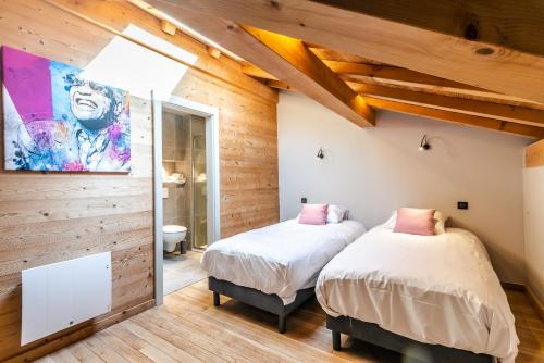 Posteľ alebo postele v izbe v ubytovaní CHALET EAGLE