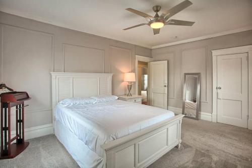 a bedroom with a bed and a ceiling fan at Suites on Seneca - Beautiful 1 Bedroom Apartment in Harrisburg