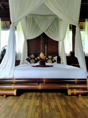 Katil atau katil-katil dalam bilik di Villa Uma Ayu Sidemen