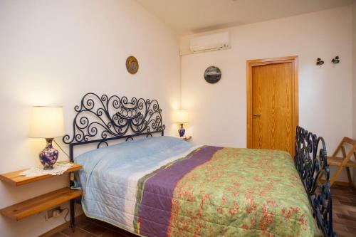 A bed or beds in a room at Villino Norsi