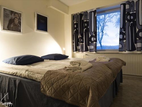 Postel nebo postele na pokoji v ubytování Hotel Utsjoki