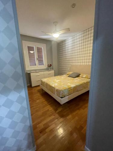 a bedroom with a bed and a window at Catedral Plaza in Murcia