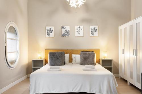 Postel nebo postele na pokoji v ubytování Sagrada Familia I by Enjoy Apartments