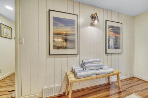 a pile of towels on a table in a room at Mulberry Pines in Saugatuck