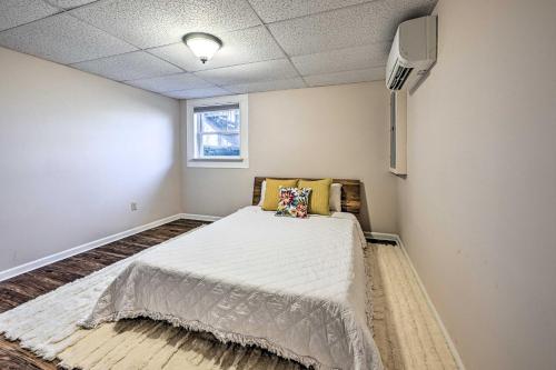 a bedroom with a bed in the corner of a room at Spacious Franklin Cabin w/ Mountain Views! in Franklin