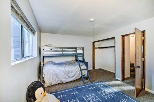 a bedroom with a bunk bed and a window at Twin Peaks Cabin Less Than 4 Mi to Lake Arrowhead! in Twin Peaks