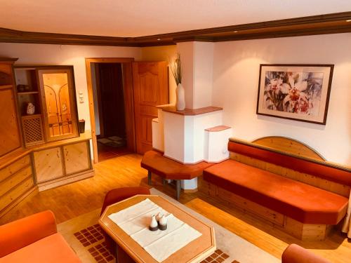 a living room with a couch and a table at Haus Lawerz in Nauders