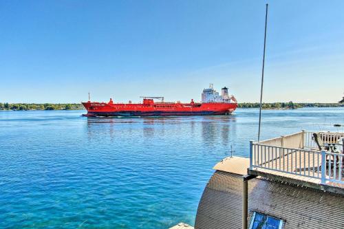 a large red ship sitting in the water at Waterfront Wellesley Island Getaway with Deck! in Fineview