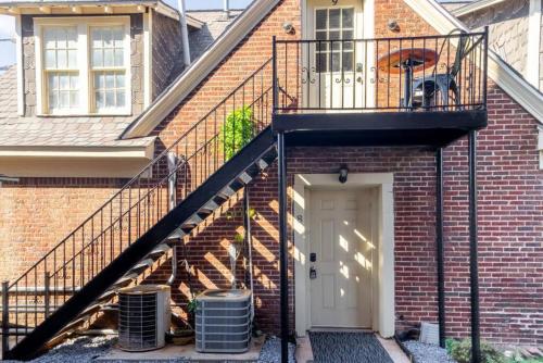 a staircase leading up to a brick house at Historic 1920s Brick Beauty in Medical District in Oklahoma City