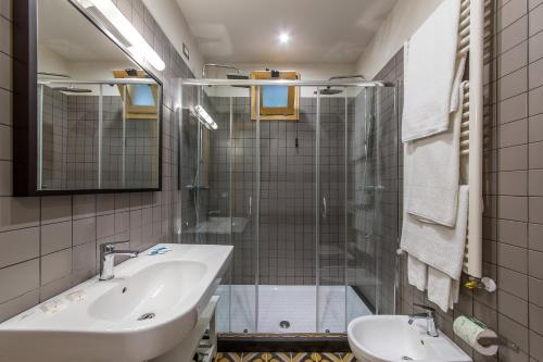 a bathroom with a sink and a shower at Masseria Agriturismo Torre Di Albidona in Trebisacce