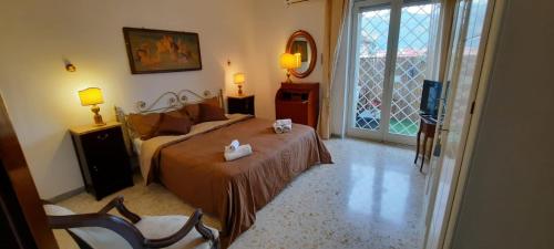 Postel nebo postele na pokoji v ubytování B&B Maria