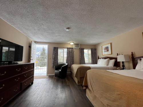 Кровать или кровати в номере Villa Motel