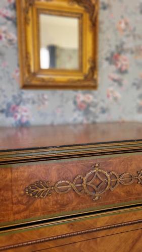 a wooden dresser with a mirror on top of it at The Elizabeth Inn and Restaurant in Bethel