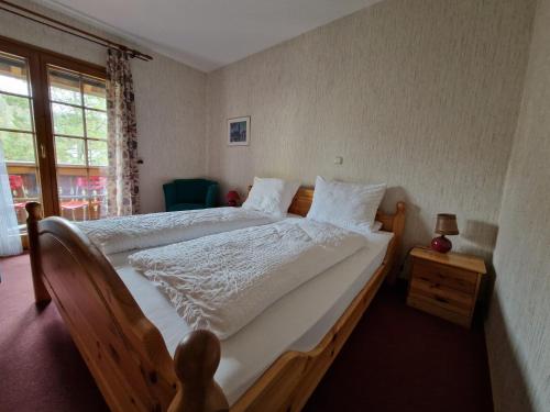 Postel nebo postele na pokoji v ubytování Hostel zum Löwen