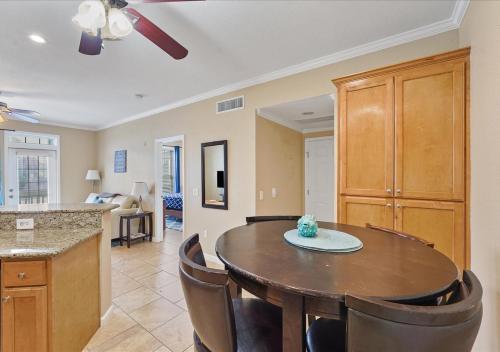 a kitchen and dining room with a table and chairs at The Dawn on Galveston Beach in Galveston