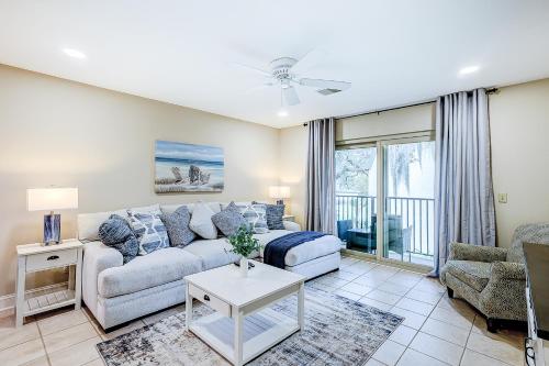 a living room with a couch and a table at Surf Court Villas 5 in Hilton Head Island