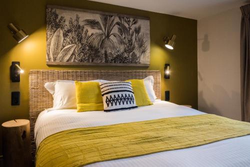 Кровать или кровати в номере Hôtel Le Patio - Deauville